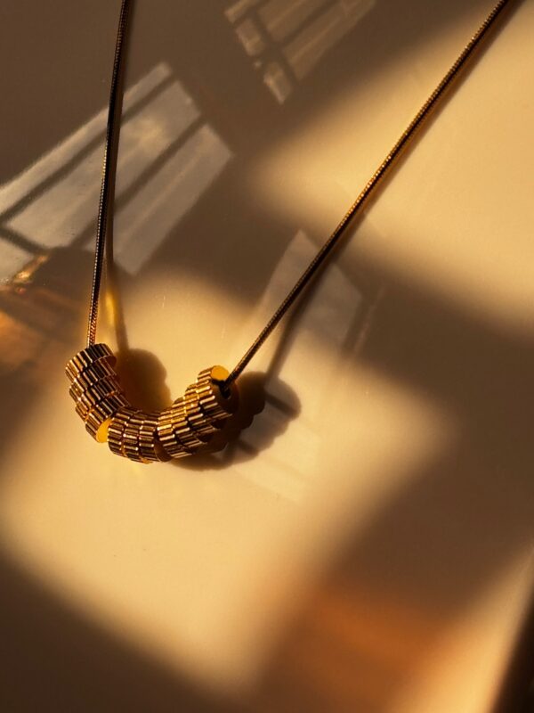 18k gold plated on stainless steel cylindrical pendant - Image 4