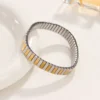 Unisex Anti tarnish/Wrap around 9mm Inter-Plane 18k gold on stainless steel Bracelet