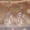 Bow tie pearl drop Korean earrings - Image 3