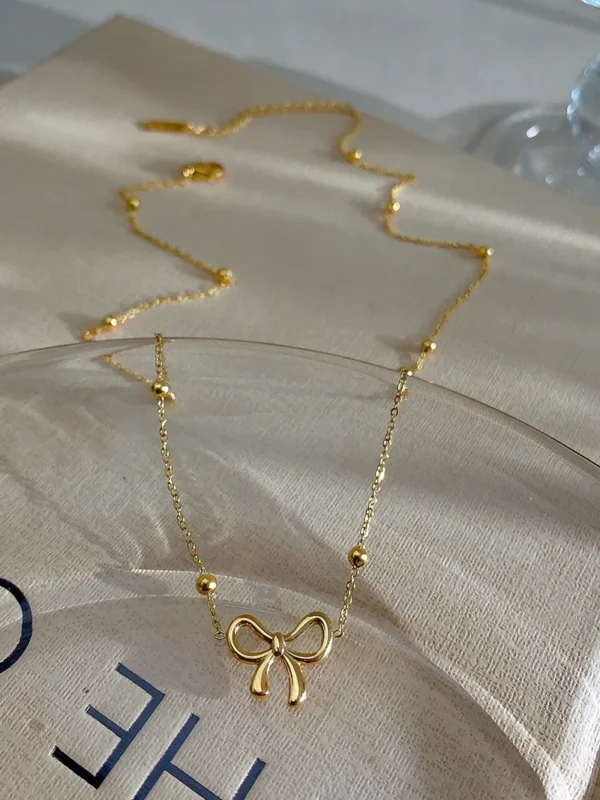 18k gold plated on 316L stainless steel bow necklace - Image 5