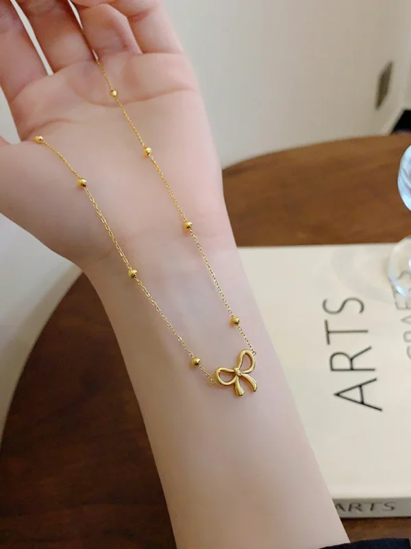 18k gold plated on 316L stainless steel bow necklace - Image 2