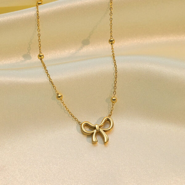 18k gold plated on 316L stainless steel bow necklace