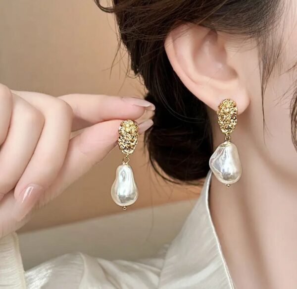 Golden hammered ,pear bottom earring