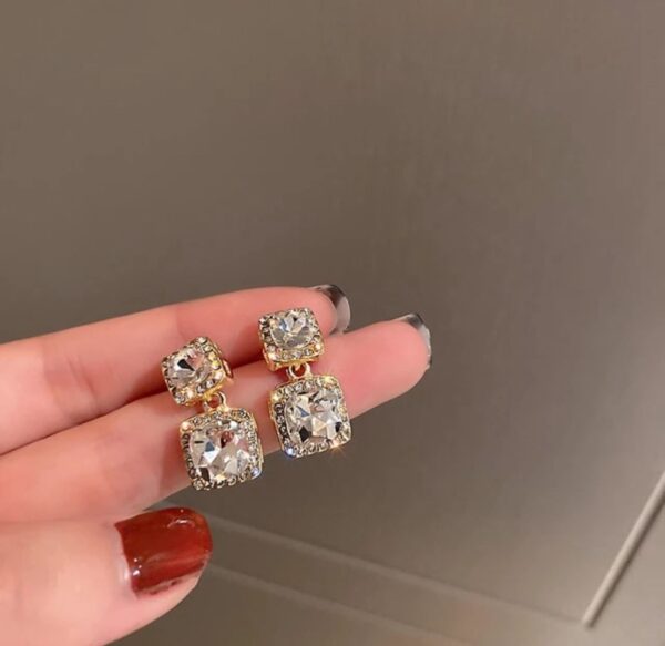 Golden with white stone Korean festive earring