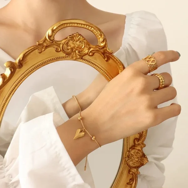 18k gold plated on stainless steel center heart chain bracelet - Image 2