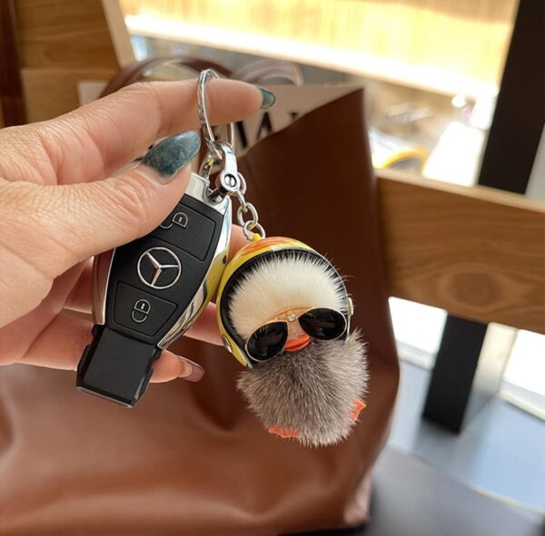 Cute Chick holding helmet premium quality key chains yellow/ Grey (single piece) - Image 4